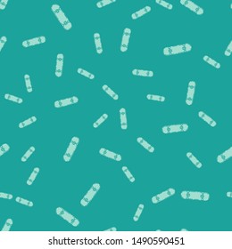 Green Skateboard trick icon isolated seamless pattern on green background. Extreme sport. Sport equipment.  Vector Illustration