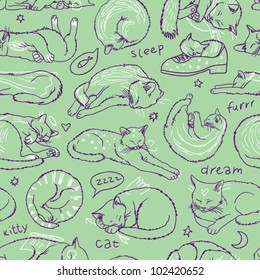 Green sleeping cats seamless pattern