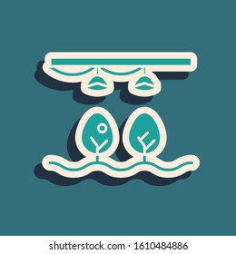 Green Smart farm with light bulb and plant symbol icon isolated on blue background. Long shadow style. Vector Illustration