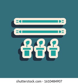 Green Smart farm with light bulb and plant symbol icon isolated on blue background. Long shadow style. Vector Illustration