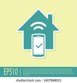 Green Smart home - remote control system icon isolated on yellow background. Vector Illustration