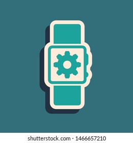 Green Smartwatch setting icon isolated on blue background. Smart watch settings. Long shadow style. Vector Illustration