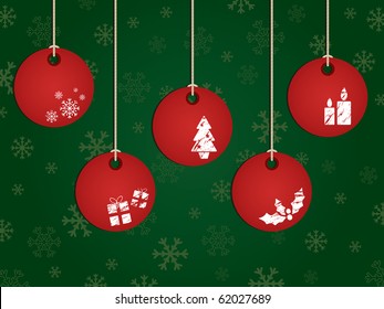 green snowflake background with red hanging christmas decorations