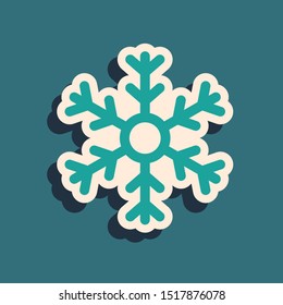 Green Snowflake icon isolated on blue background. Long shadow style. Vector Illustration