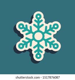 Green Snowflake icon isolated on blue background. Long shadow style. Vector Illustration