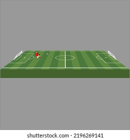 Green soccer field with soccer player and soccer ball