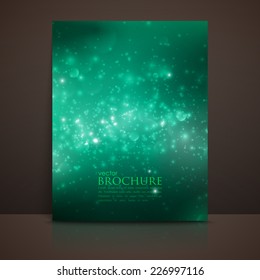 green sparkling background with glowing sparkles and glitters. Shiny holiday vector brochure or postcard template