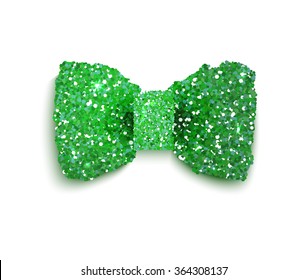 Green sparkling glitter decorated bow, vector illustration for St. Patrick's Day