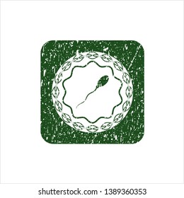 Green sperm icon inside distress grunge style stamp
