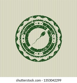 Green sperm icon inside distressed with rubber seal texture
