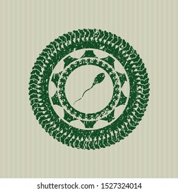 Green sperm icon inside distressed grunge style stamp