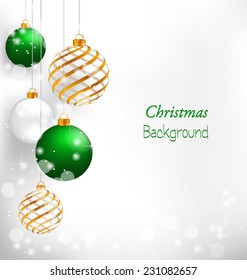 Green spiral christmas balls hang on white background
