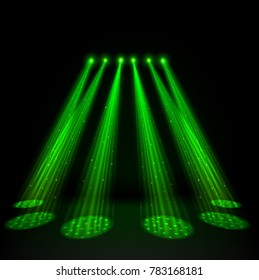 Green spotlights on dark background