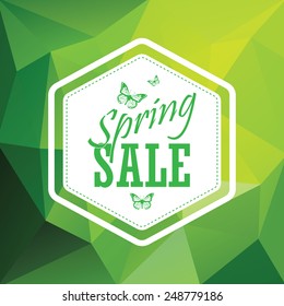 Green spring sale low polygonal background with hexagonal vintage badge. Creative typography and butterflies. Eps10 vector illustration