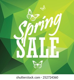 Green spring sale low polygonal background with creative typography and butterflies. Eps10 vector illustration