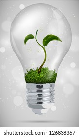 green sprout in the bulb. the concept of clean energy