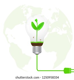 Green sprout in light bulb connected to electrical plug on blurred globe background, alternative green energy environmental concept