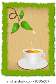 Green sprout with straw and cup of tea in frame of grass