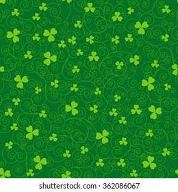 Green St. Patrick's day background with swirls and clover leaves.