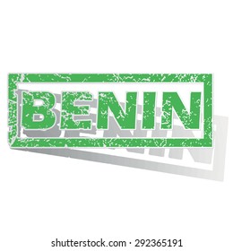 Green stamp with name Benin and shadow, isolated on white