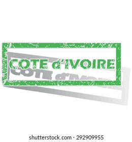 Green stamp with name Cote d Ivoire and shadow, isolated on white