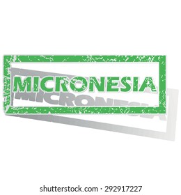 Green stamp with name Micronesia and shadow, isolated on white