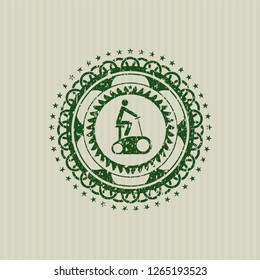 Green stationary bike icon inside rubber grunge stamp