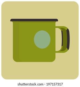 Green  steel enamel cup on plain background