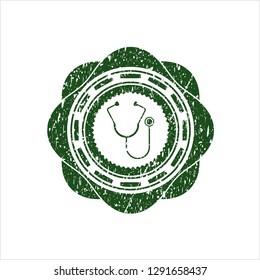 Green stethoscope icon inside distress rubber seal