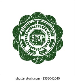 Green stop icon inside grunge stamp