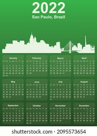 Green stylish 2022 year calendar with cityscape panorama of the city of Sao Paulo, Brazil