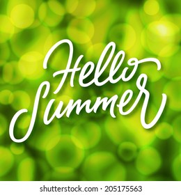 Green summertime background with defocused lights bokeh effect and handmade lettering Hello Summer