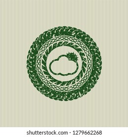 Green sun behind cloud icon inside distress rubber grunge texture seal