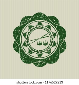 Green sushi icon inside rubber grunge texture seal