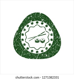 Green sushi icon inside rubber stamp