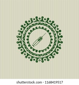 Green syringe icon inside distress grunge seal
