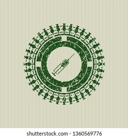 Green syringe icon inside distressed grunge style stamp