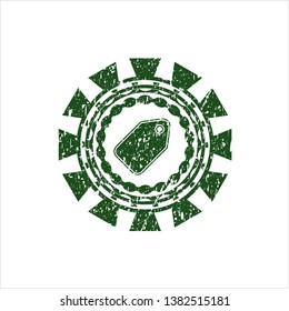 Green tag icon inside distressed rubber texture