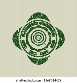 Green target, business icon inside distress rubber grunge seal
