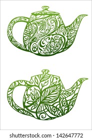 green tea concept, kettle with floral ornament