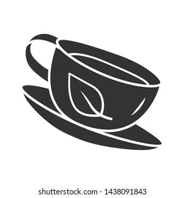 Green tea cup glyph icon. Natural, eco herbal drink. Coffee shop, cafe logo. Silhouette symbol. Detox dietary drinking. Negative space. Porcelain mug with beverage vector isolated illustration