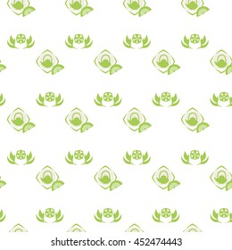 Green tea leaves and teapot seamless background. Pattern in chinese style.