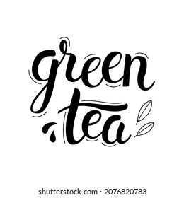 Green tea lettering and leaves. Hand drawn calligraphy and brush pen lettering phrase. Isolated vector illustration