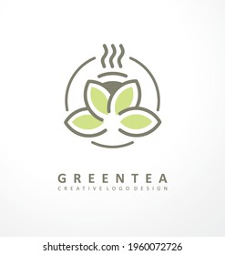 Green tea logo design idea with cup of tea made of green leaves. Hot drink symbol idea. Tea shop vector line art icon layout.