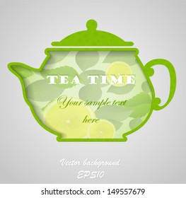 Green tea pot formed from paper with space for text inside it.