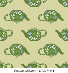 Las teteras verdes adornan un patrón impecable. Platos de cerámica con flores de fondo beige claro. Perfecto para papel pintado, textil, papel envolvente, impresión de tela. Ilustración vectorial.