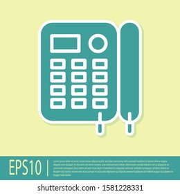 Green Telephone icon isolated on yellow background. Landline phone.  Vector Illustration