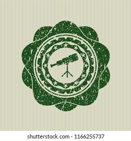 Green telescope icon inside distressed rubber stamp