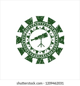 Green telescope icon inside rubber texture