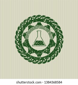 Green test tube icon inside grunge style stamp